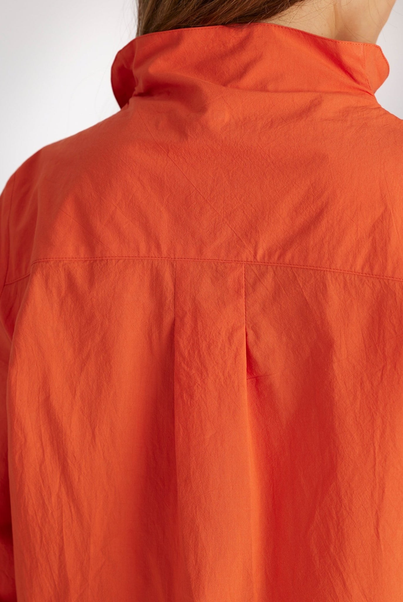 Bluse BLYZANTIS mit Kelchkragen, langen Ärmeln und kastiger Form in Orange