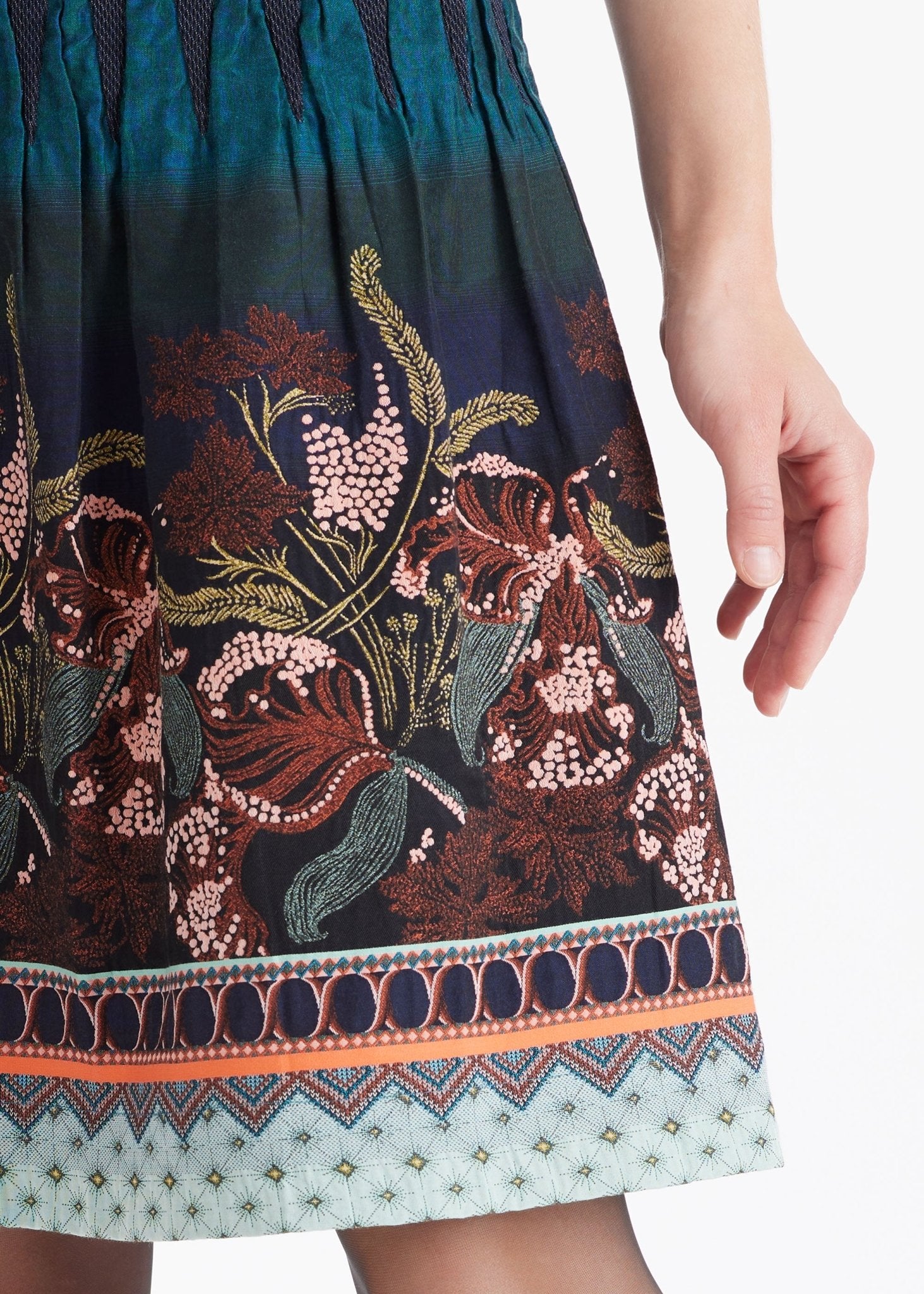 Kurzer Rock LACROS-W mit Gummibund und abstraktem Muster in Petrol