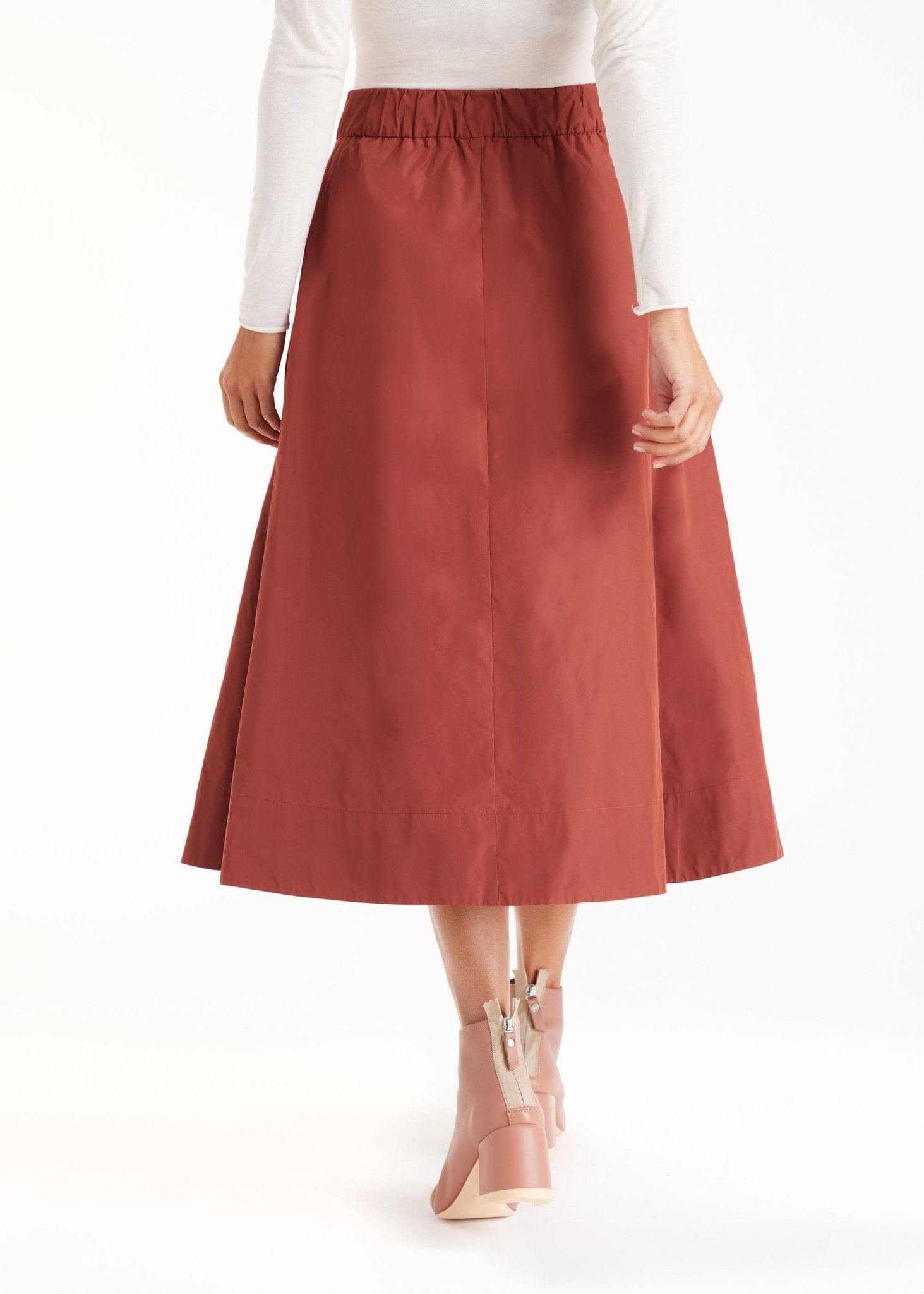 Rock GOMYRO in Midi-Länge mit Falten und Eingrifftaschen in Braun