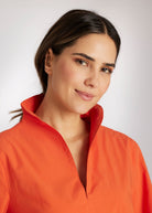 Bluse BLYZANTIS mit Kelchkragen, langen Ärmeln und kastiger Form in Orange